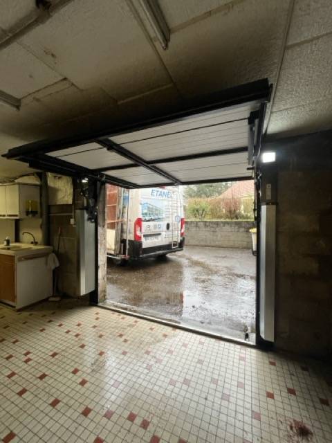 Installation porte de garage ETANEL : professionnels qualifiés pour un résultat optimal