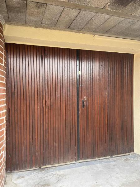 Porte sectionnelle plafond seine-maritime couleur chêne luxe isolante garantie 30 000 Cycles sécurisée et design