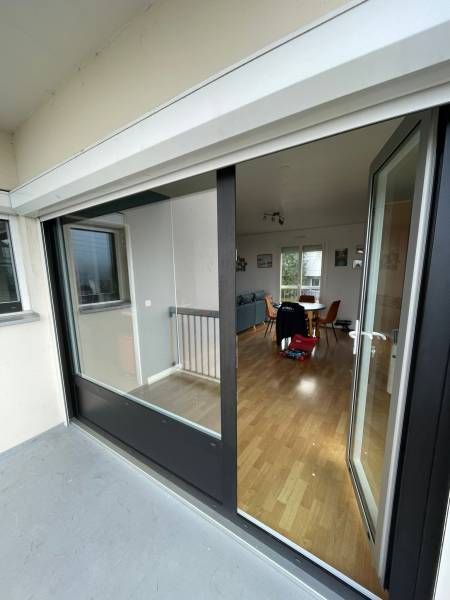 Fenêtre aluminium SiLine SIMA bicoloration RAL 9016 intérieur RAL 9005G extérieur pose Normandie
