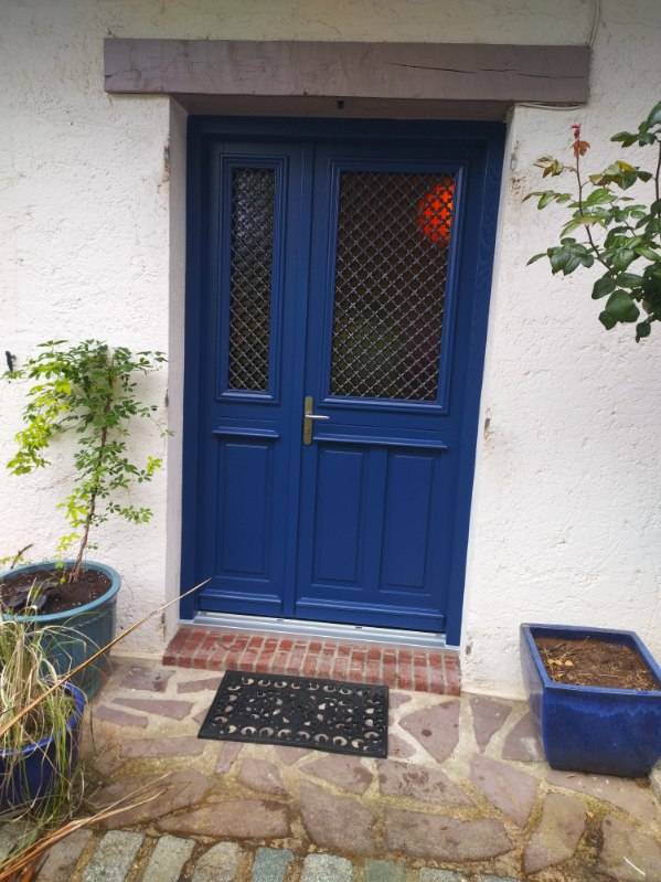 Porte d'entrée bois sur mesure personnalisée sécurisée isolante normandie professionnel sans sous traitance