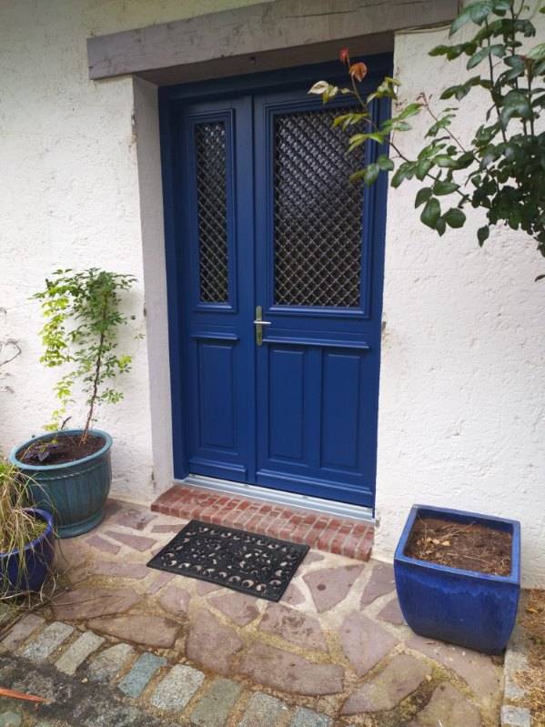Porte d'entrée bois sur mesure personnalisée sécurisée isolante normandie professionnel sans sous traitance